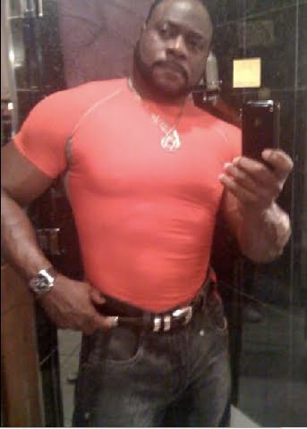 Man Sexy tight orange muscle shirt wearing-Bishop Eddie Long!!!..You like?